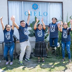 A group of people at the front of Cielo